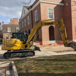Excavating for Water Main Repair at Lake Forest High School in NW Illinois by Behm Enterprises